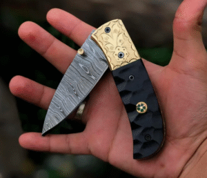 Handmade Damascus Steel Folding Knife: Black Micarta Handle, Leather Sheath